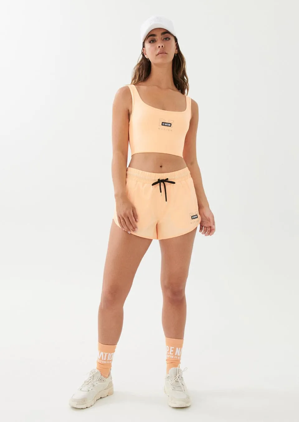 RAMP RUN SHORT IN PASTEL PEACH
