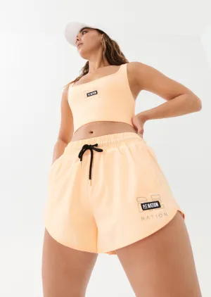 RAMP RUN SHORT IN PASTEL PEACH