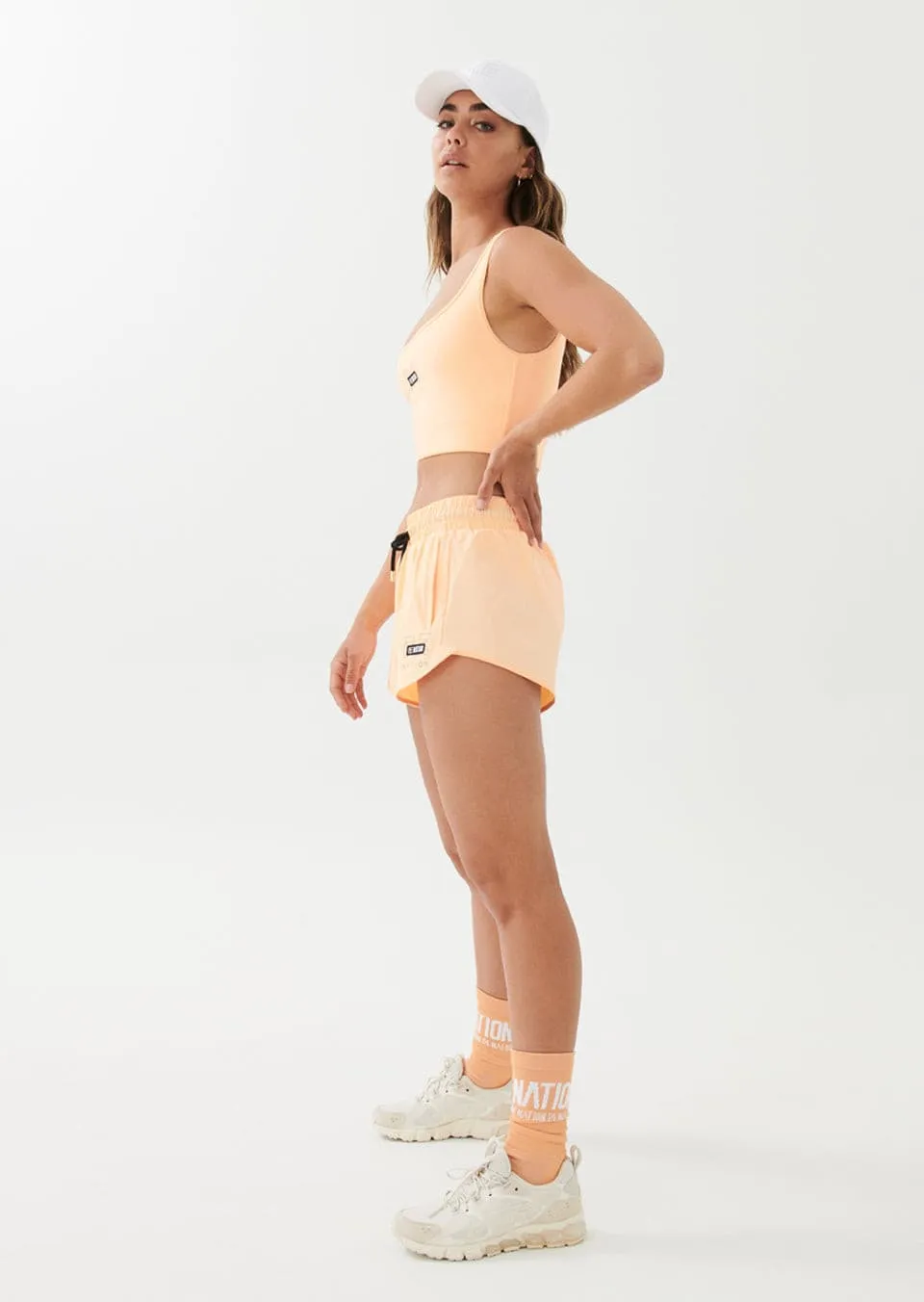RAMP RUN SHORT IN PASTEL PEACH